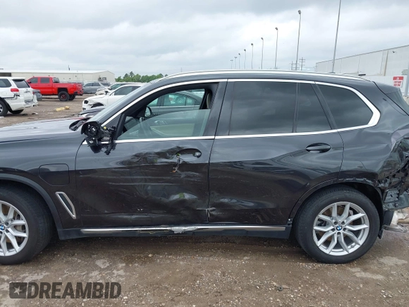 2021 BMW X5 xDrive45e with VIN 5UXTA6C02M9F88978, listed as a IAAI auction lot 42201563 with 23,339 mi miles and . Bid and sale history available at DreamBid. Image 15.