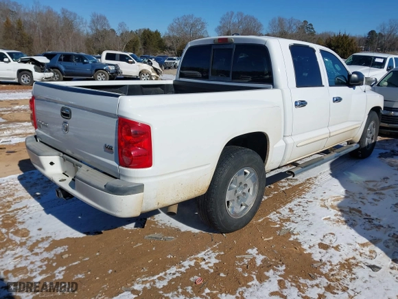 2005 Dodge Dakota Laramie with VIN 1D7HE58N35S138912, listed as a IAAI auction lot 41359470 with 263,136 mi miles. Bid and sale history available at carsss.com. Image 4.