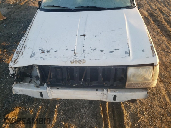 1993 Jeep Grand Cherokee Laredo with VIN 1J4GZ58Y9PC677532, listed as a Copart auction lot 44391245 with 178,772 mi miles and Salvage Title. Bid and sale history available at carsss.com. Image 13.