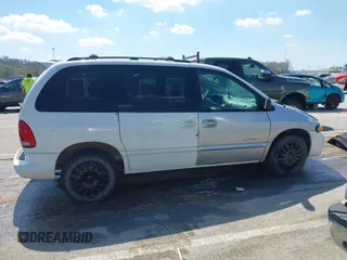 1999 Dodge Caravan z VIN 1B4GP45G2XB554868, wystawiony jako IAAI lot #41882038 z przebiegiem 130 743 mil mil oraz . Historia ofert i sprzedaży dostępna na DreamBid. Obrazek 13.