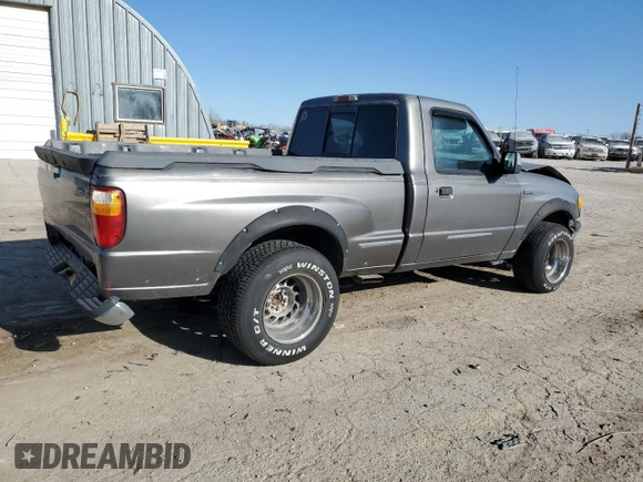 1999 Mazda B-Series Truck SX z VIN 4F4YR12C5XTM24067, wystawiony jako Copart lot #85241964 z przebiegiem 219 030 mil mil oraz Szkoda całkowita • Salvage title. Historia ofert i sprzedaży dostępna na DreamBid. Obrazek 3.