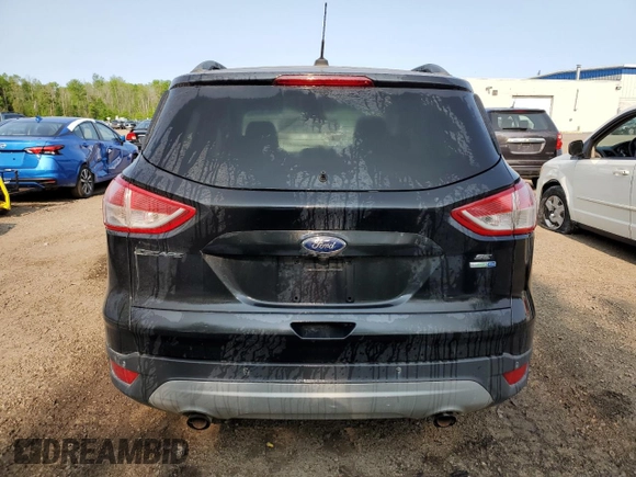 2014 Ford Escape SE with VIN 1FMCU9GX2EUB50177, listed as a Copart auction lot 58579645 with 228,017 mi miles and Salvage title. Bid and sale history available at DreamBid. Image 6.