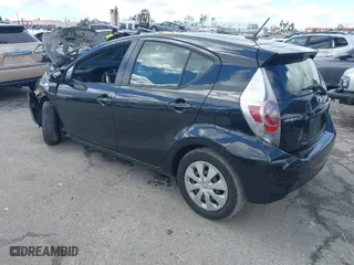 2012 Toyota Prius c One with VIN JTDKDTB3XC1030112, listed as a IAAI auction lot 41794291 with 105,124 mi miles. Bid and sale history available at carsss.com. Image 3.