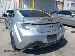 2023 Toyota GR86 Premium with VIN JF1ZNBF15P8759278, listed as a IAAI auction lot 41765684 with 21,300 mi miles. Bid and sale history available at carsss.com. Image 3.