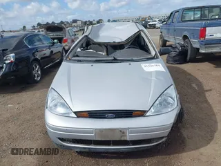 2000 Ford Focus ZX3 with VIN 3FAFP3139YR210307, listed as a IAAI auction lot 41946264 with 215,233 mi miles and . Bid and sale history available at DreamBid. Image 12.