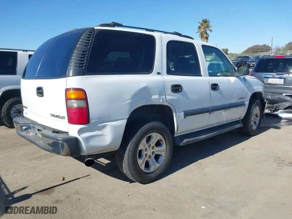 2001 Chevrolet Tahoe LT with VIN 1GNEC13T01J132932, listed as a IAAI auction lot 41398864 with 151,411 mi miles. Bid and sale history available at carsss.com. Image 4.