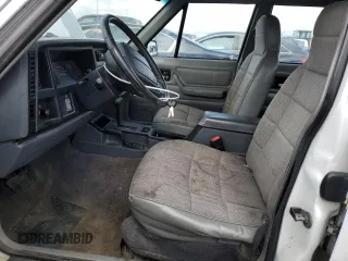 1995 Jeep Cherokee Sport z VIN 1J4FJ68S8SL650142, wystawiony jako Copart lot #51923775 z przebiegiem 329 796 mil mil oraz Czysty tytuł • Clean title. Historia ofert i sprzedaży dostępna na DreamBid. Obrazek 7.