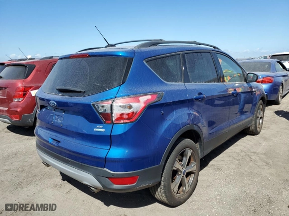 2017 Ford Escape SE with VIN 1FMCU0GD2HUA19806, listed as a Copart auction lot 76165064 with 97,697 mi miles and Salvage Title. Bid and sale history available at carsss.com. Image 3.