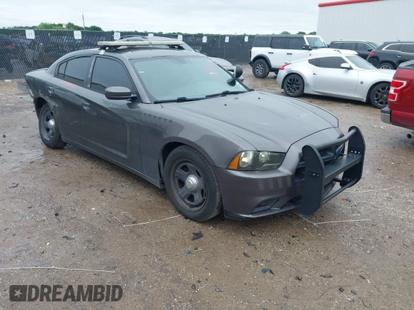 2013 Dodge Charger Police z VIN 2C3CDXAT4DH521778, wystawiony jako IAAI lot #42169438 z przebiegiem 191 907 mil mil oraz . Historia ofert i sprzedaży dostępna na DreamBid. Obrazek 1.