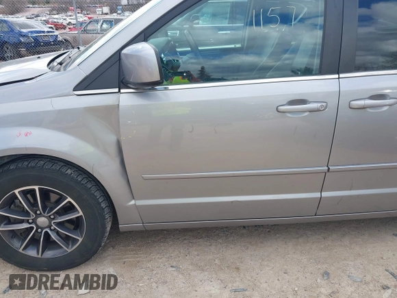 2017 Dodge Grand Caravan SXT with VIN 2C4RDGCG6HR671199, listed as a IAAI auction lot 42031157 with 99,189 mi miles and . Bid and sale history available at DreamBid. Image 18.
