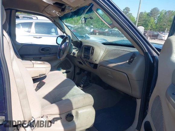 2003 Ford F-150 XL with VIN 1FTRX18LX3NA50127, listed as a IAAI auction lot 42145481 with 199,955 mi miles and . Bid and sale history available at DreamBid. Image 5.