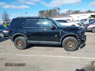 2023 Ford Bronco Sport Badlands z VIN 3FMCR9D95PRD26169, wystawiony jako IAAI lot #41723643 z przebiegiem 21 181 mil mil oraz . Historia ofert i sprzedaży dostępna na DreamBid. Obrazek 13.