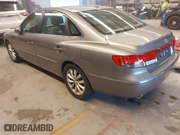 2007 Hyundai Azera SE with VIN KMHFC46F07A243229, listed as a IAAI auction lot 41261394 with 249,523 mi miles and . Bid and sale history available at DreamBid. Image 3.