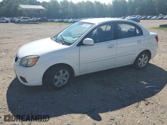 2010 Kia Rio LX with VIN KNADH4A31A6635895, listed as a Copart auction lot 61308434 with 209,016 mi miles and Salvage Title. Bid and sale history available at carsss.com. Image 1.