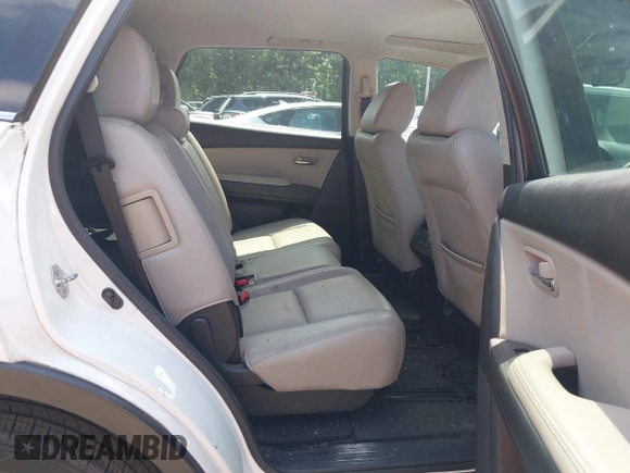 2014 Mazda CX-9 Touring z VIN JM3TB3CV7E0426900, wystawiony jako IAAI lot #42796725 z przebiegiem Nie podano mil oraz . Historia ofert i sprzedaży dostępna na DreamBid. Obrazek 8.