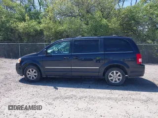 2010 Chrysler Town & Country Touring with VIN 2A4RR5D10AR282784, listed as a IAAI auction lot 42231696 with 173,049 mi miles and . Bid and sale history available at DreamBid. Image 14.