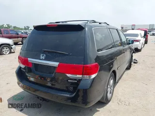 2010 Honda Odyssey Touring с VIN 5FNRL3H90AB070720, выставлен на аукционе IAAI как лот 42335181 с пробегом 145 205 миль миль и . История ставок и продаж доступна на DreamBid. Изображение 4.