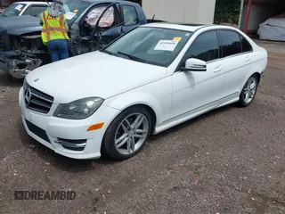 2014 Mercedes-Benz C 250 Sport with VIN WDDGF4HB8EG198230, listed as a IAAI auction lot 42519658 with 152,934 mi miles and . Bid and sale history available at DreamBid. Image 17.