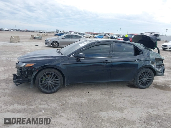 2022 Toyota Camry XSE z VIN 4T1K61AK2NU700840, wystawiony jako IAAI lot #41352884 z przebiegiem 98 634 mil mil oraz . Historia ofert i sprzedaży dostępna na DreamBid. Obrazek 6.