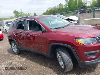 2021 Jeep Compass Latitude with VIN 3C4NJDBBXMT504993, listed as a IAAI auction lot 42181872 with 56,053 mi miles and . Bid and sale history available at DreamBid. Image 13.
