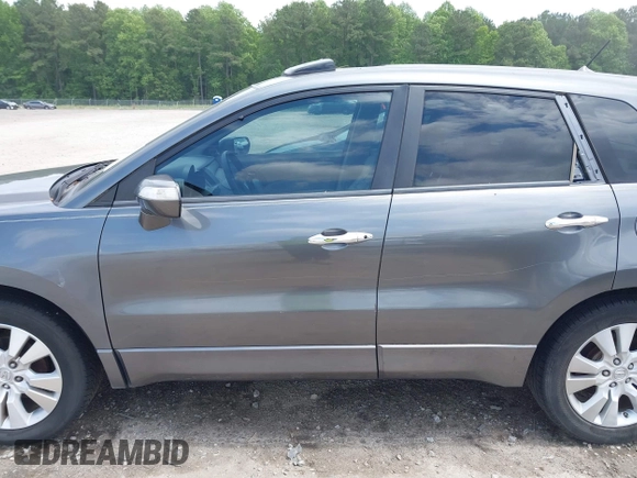 2011 Acura RDX with VIN 5J8TB2H29BA002353, listed as a IAAI auction lot 42220358 with 170,905 mi miles and . Bid and sale history available at DreamBid. Image 14.