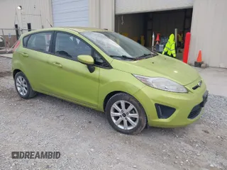 2011 Ford Fiesta SE with VIN 3FADP4EJXBM164397, listed as a IAAI auction lot 42046591 with 118,953 mi miles. Bid and sale history available at carsss.com. Image 1.