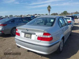 2004 BMW 3 Series 325i with VIN WBAAZ33494KP83238, listed as a IAAI auction lot 41594397 with 1 mi miles. Bid and sale history available at carsss.com. Image 4.