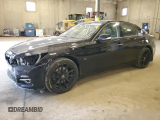 2014 Infiniti Q50 Premium with VIN JN1BV7ARXEM695977, listed as a Copart auction lot 52209795 with 100,700 mi miles and Salvage Title. Bid and sale history available at DreamBid. Image 1.