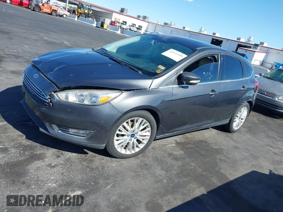2017 Ford Focus Titanium with VIN 1FADP3N25HL299817, listed as a IAAI auction lot 42161440 with 154,974 mi miles and . Bid and sale history available at carsss.com. Image 14.