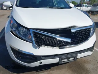 2015 Kia Sportage LX with VIN KNDPB3AC9F7715443, listed as a IAAI auction lot 42183933 with 115,211 mi miles and . Bid and sale history available at carsss.com. Image 6.