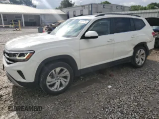 2023 Volkswagen Atlas SE with VIN 1V2KR2CA2PC524739, listed as a Copart auction lot 56976715 with 58,736 mi miles and Salvage title. Bid and sale history available at DreamBid. Image 1.