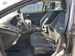 2015 Ford Focus SE z VIN 1FADP3F29FL340350, wystawiony jako Copart lot #53466455 z przebiegiem 146 374 mil mil oraz Szkoda całkowita • Salvage title. Historia ofert i sprzedaży dostępna na DreamBid. Obrazek 7.