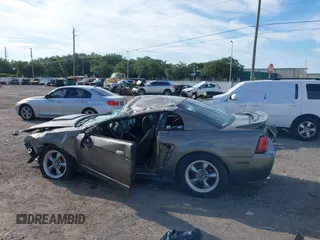 2004 Ford Mustang Standard z VIN 1FAFP40684F194867, wystawiony jako IAAI lot #39963442 z przebiegiem Nie podano mil oraz . Historia ofert i sprzedaży dostępna na DreamBid. Obrazek 14.