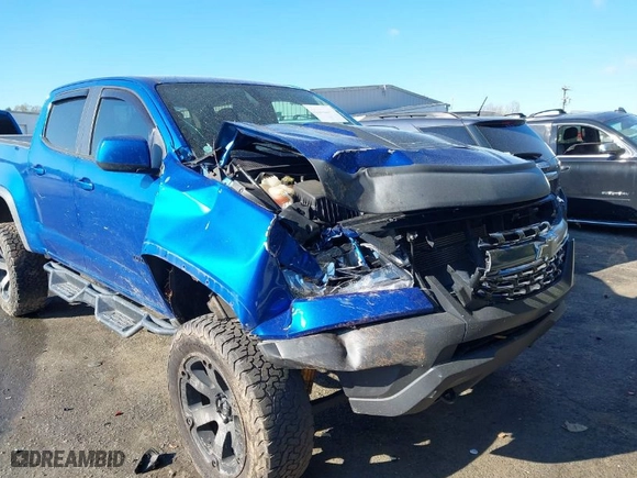 2019 Chevrolet Colorado 4WD ZR2 with VIN 1GCGTEEN5K1279370, listed as a IAAI auction lot 41879724 with 99,012 mi miles. Bid and sale history available at carsss.com. Image 6.