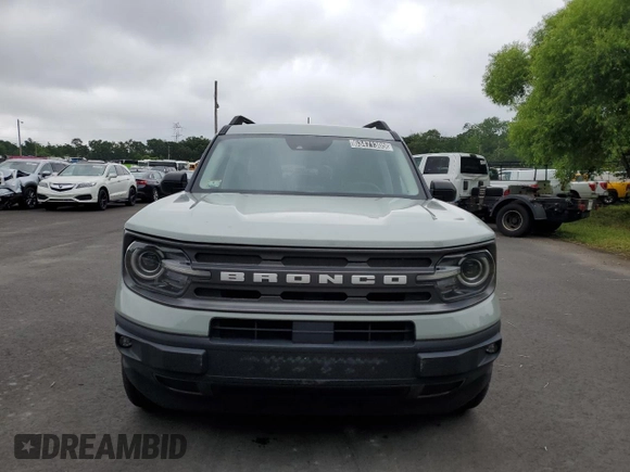 2021 Ford Bronco Sport Big Bend z VIN 3FMCR9B65MRA19220, wystawiony jako Copart lot #63471305 z przebiegiem 123 584 mil mil oraz Czysty tytuł • Clean title. Historia ofert i sprzedaży dostępna na DreamBid. Obrazek 5.