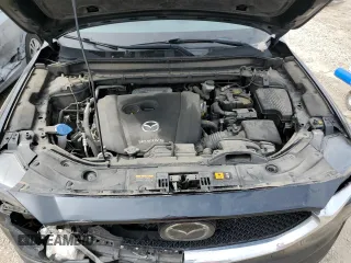 2021 Mazda CX-5 Grand Touring with VIN JM3KFBDM6M0401517, listed as a Copart auction lot 51019645 with 55,906 mi miles and Salvage Title. Bid and sale history available at DreamBid. Image 14.