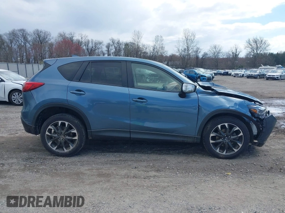 2016 Mazda CX-5 Grand Touring with VIN JM3KE4DY0G0629924, listed as a IAAI auction lot 41878154 with 78,196 mi miles. Bid and sale history available at carsss.com. Image 13.