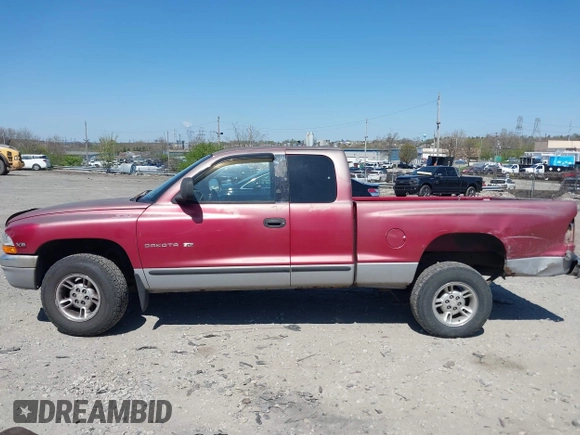 1999 Dodge Dakota SLT z VIN 1B7GL22X2XS222162, wystawiony jako IAAI lot #42038943 z przebiegiem 222 883 mil mil oraz . Historia ofert i sprzedaży dostępna na DreamBid. Obrazek 13.