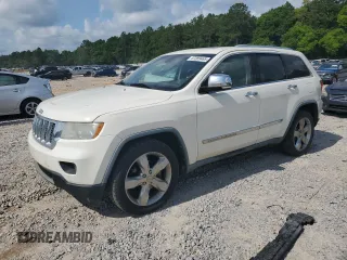 2011 Jeep Grand Cherokee Overland with VIN 1J4RR6GG0BC607451, listed as a Copart auction lot 57389465 with 262,527 mi miles and Salvage title. Bid and sale history available at DreamBid. Image 1.