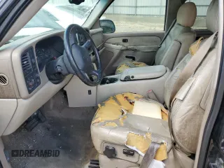 2002 GMC Yukon SLT z VIN 1GKEC13Z42J333817, wystawiony jako Copart lot #54819725 z przebiegiem 302 313 mil mil oraz Szkoda całkowita • Salvage title. Historia ofert i sprzedaży dostępna na DreamBid. Obrazek 7.
