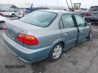 1999 Honda Civic EX z VIN 2HGEJ8643XH532751, wystawiony jako IAAI lot #42020290 z przebiegiem 239 316 mil mil oraz . Historia ofert i sprzedaży dostępna na DreamBid. Obrazek 4.