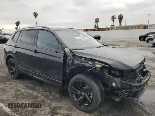 2023 Volkswagen Tiguan SE R-Line Black z VIN 3VVCB7AXXPM033818, wystawiony jako Copart lot #48759425 z przebiegiem 24 260 mil mil oraz Szkoda całkowita • Salvage title. Historia ofert i sprzedaży dostępna na DreamBid. Obrazek 4.