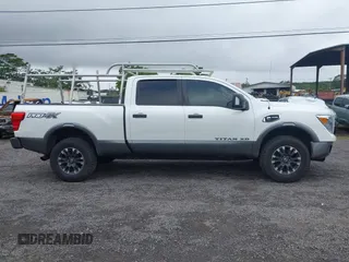 2017 Nissan Titan XD PRO-4X with VIN 1N6BA1F47HN517135, listed as a IAAI auction lot 41605323 with 108,984 mi miles. Bid and sale history available at carsss.com. Image 13.