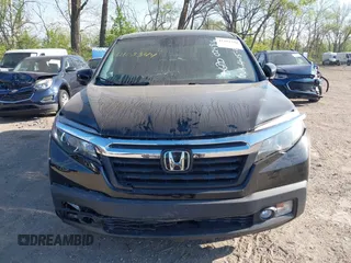 2020 Honda Ridgeline RTL with VIN 5FPYK3F52LB024816, listed as a IAAI auction lot 42103344 with 68,700 mi miles and . Bid and sale history available at DreamBid. Image 12.