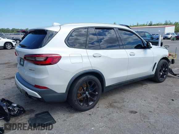 2019 BMW X5 xDrive40i with VIN 5UXCR6C51KLK83456, listed as a IAAI auction lot 42027389 with 94,332 mi miles and . Bid and sale history available at DreamBid. Image 4.