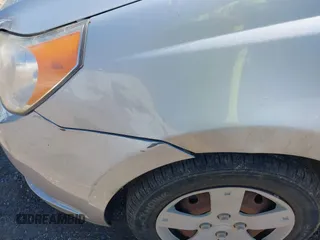 2009 Chevrolet Aveo 1LT with VIN KL1TD66E19B651119, listed as a IAAI auction lot 41648261 with 132,456 mi miles and . Bid and sale history available at DreamBid. Image 12.