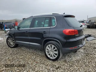2015 Volkswagen Tiguan SE z VIN WVGBV7AXXFW606017, wystawiony jako Copart lot #51005745 z przebiegiem Nie podano mil oraz Szkoda całkowita • Salvage title. Historia ofert i sprzedaży dostępna na DreamBid. Obrazek 2.