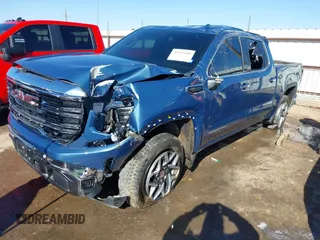 2024 GMC Sierra 1500 SLT with VIN 3GTPHDEDXRG299077, listed as a IAAI auction lot 41415109 with 16,141 mi miles and . Bid and sale history available at DreamBid. Image 2.