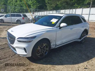 2023 Genesis GV70 2.5T with VIN KMUMADTB7PU120364, listed as a IAAI auction lot 42186139 with 24,686 mi miles and . Bid and sale history available at DreamBid. Image 2.