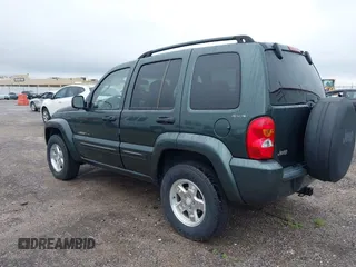 2002 Jeep Liberty Limited z VIN 1J4GL58K12W213087, wystawiony jako IAAI lot #42196895 z przebiegiem 85 110 mil mil oraz . Historia ofert i sprzedaży dostępna na DreamBid. Obrazek 3.